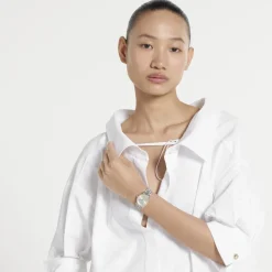 29 mm Edelstahlgehäuse, roségold plattierter Lünette, silbernes Zifferblatt, Edelstahlarmband, Quarzwerk
