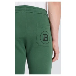 Baumwoll-Sweatpants mit flockigem Paris-Logo