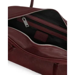Dunkelbraune ovalförmige Ledertasche mit Borsten