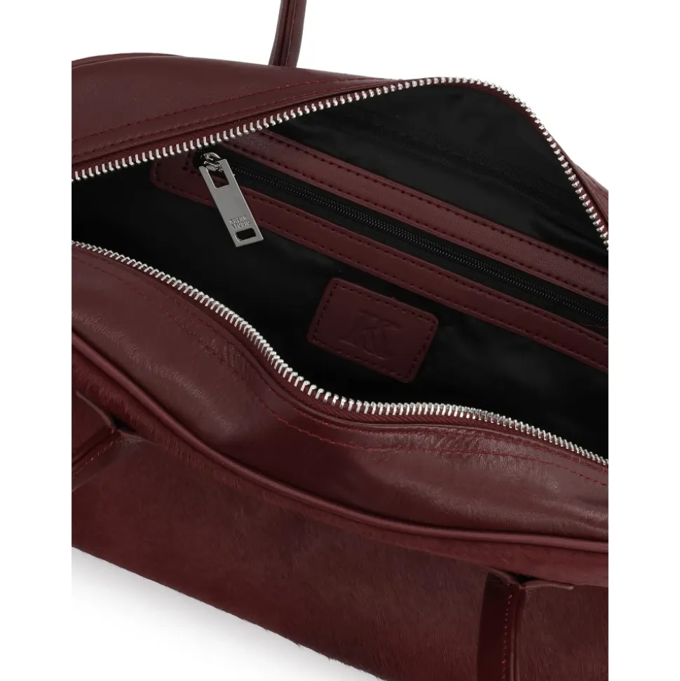 Dunkelbraune ovalförmige Ledertasche mit Borsten