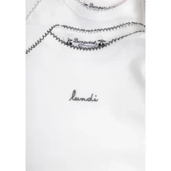 Geschenkset: Bodysuit 7er-Pack, Haarbürste und Zahndose.