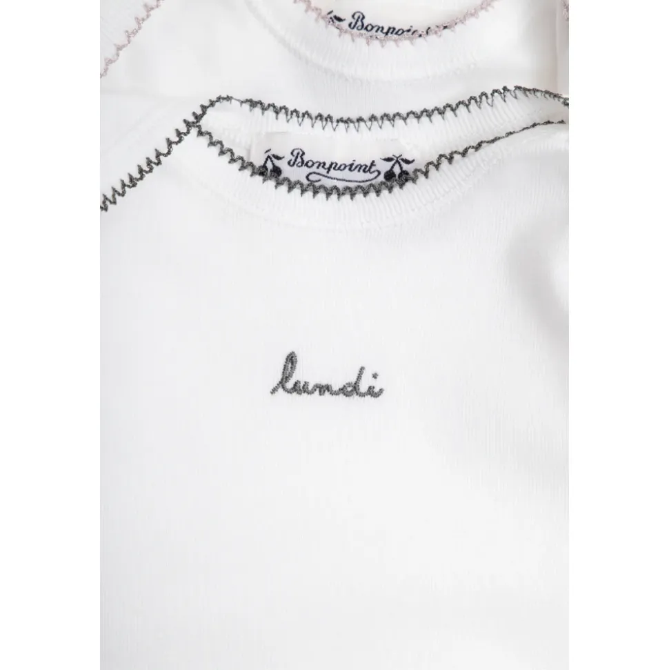 Geschenkset: Bodysuit 7er-Pack, Haarbürste und Zahndose.
