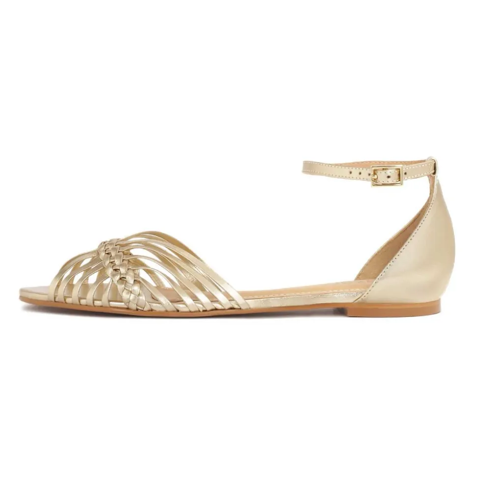 Goldene flache Sandalen mit eingebautem Absatz