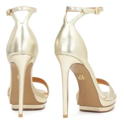 Goldene Plateausandalen
