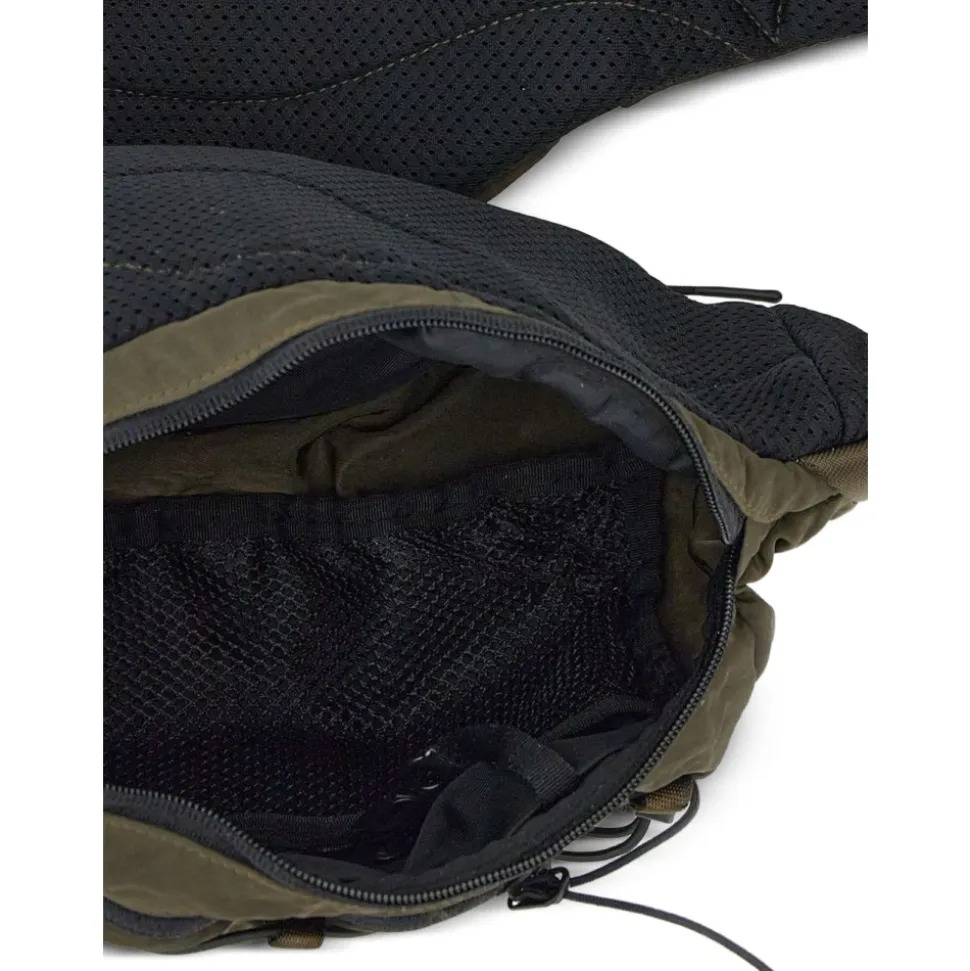 Grüne Schultertasche mit Linsendetail