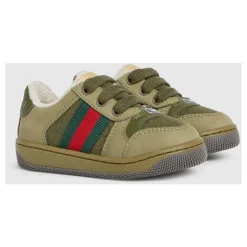 Grüne Sneakers für Kinder mit Webstreifen