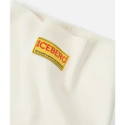 KINDER - Vanille Wollstirnband mit Eisberg-Logo auf gelbem Etikett