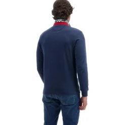 Langarm-Polo in Blau mit rotem Logo