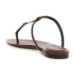 Lederne flache Sandalen mit YSL-Logo