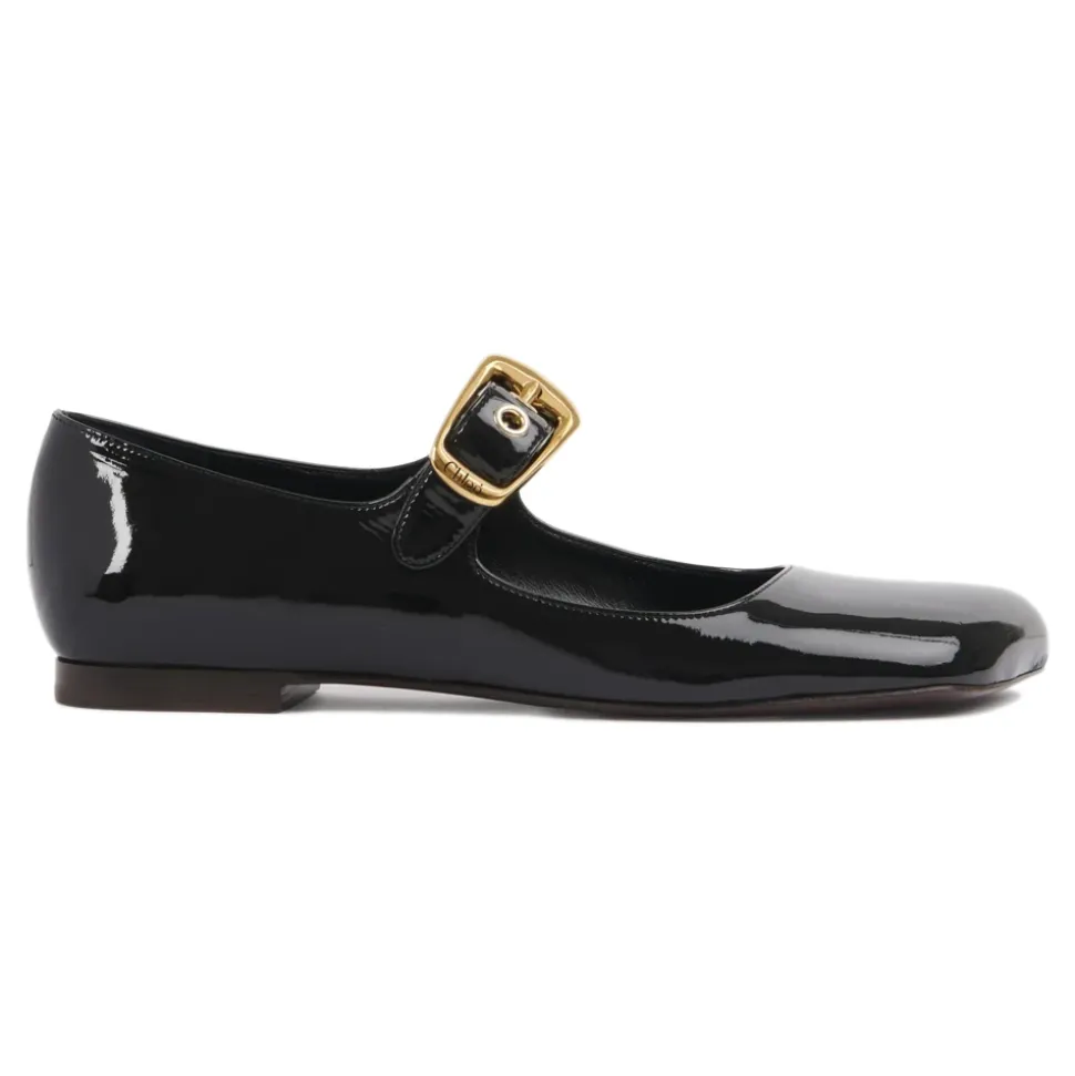Schwarze Ballerinas mit übergroßer goldener Schnalle