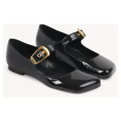 Schwarze Ballerinas mit übergroßer goldener Schnalle