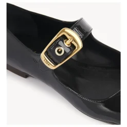 Schwarze Ballerinas mit übergroßer goldener Schnalle