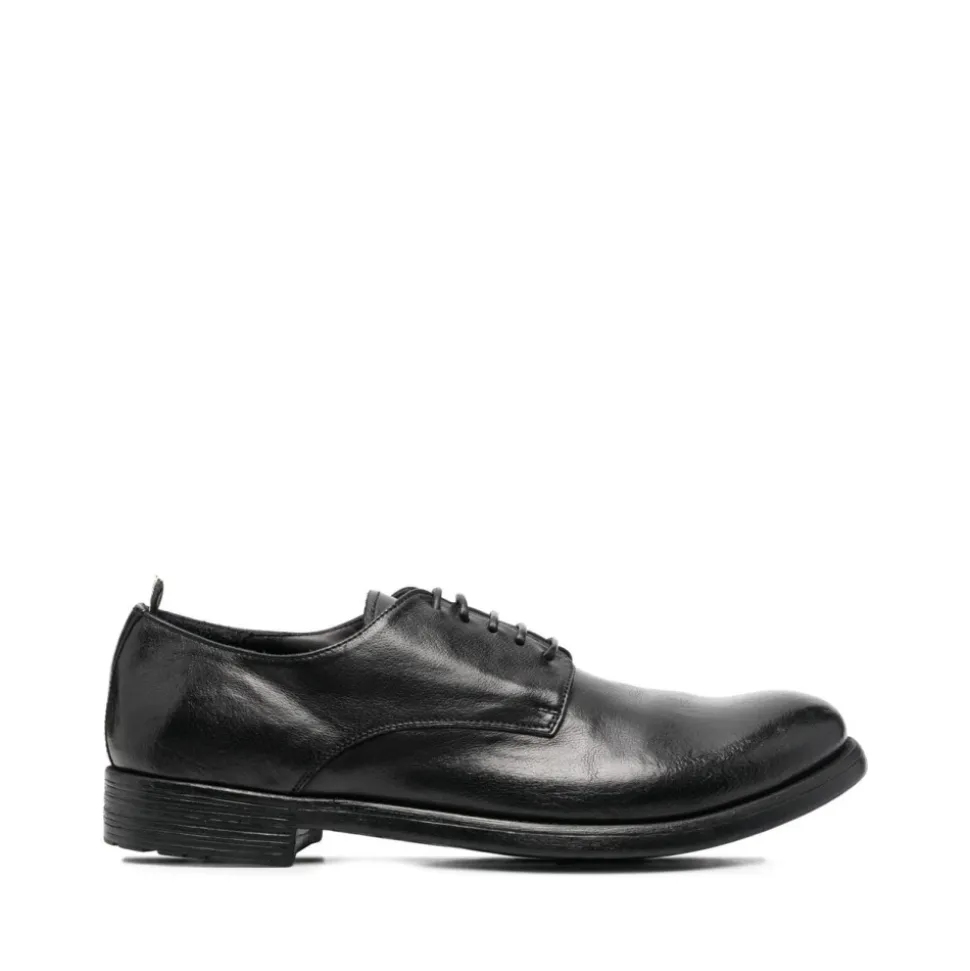 Schwarze flache Schuhe