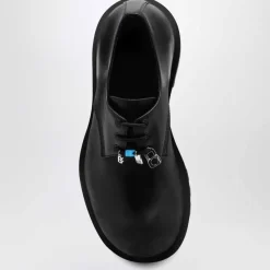 Schwarze flache Schuhe Derby Stil