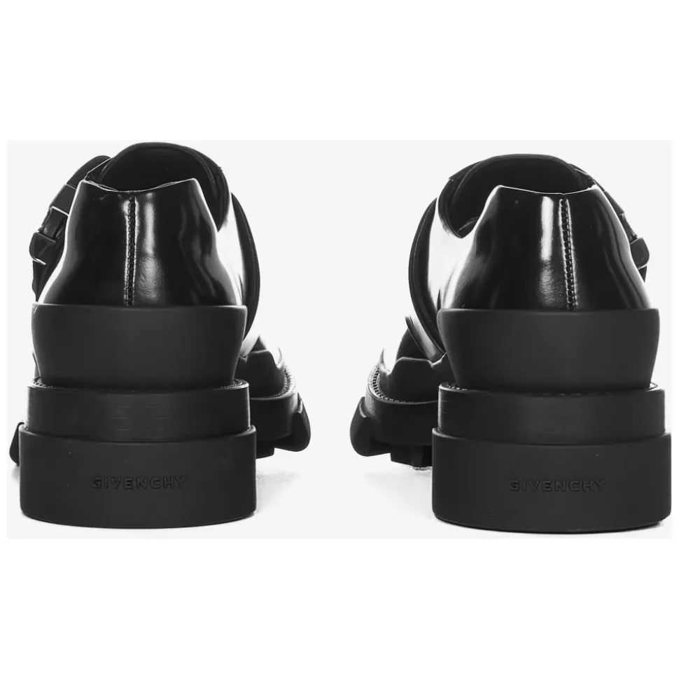 Schwarze flache Schuhe mit verstellbarem Riemen und 4G-Metallschnalle