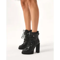 Schwarze geprägte Lederstiefel.Dieses Produkt fällt klein aus.