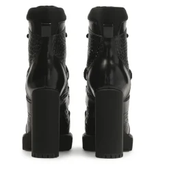 Schwarze geprägte Lederstiefel.Dieses Produkt fällt klein aus.