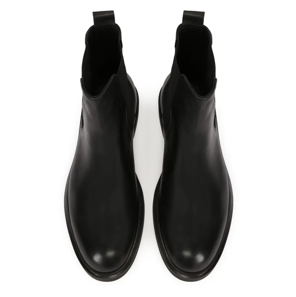 Schwarze Slipper aus glattem Leder