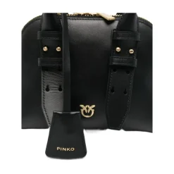 Schwarze Tasche mit oberen Griffen und goldfarbener Hardware