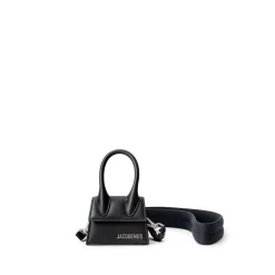 Schwarzer Leder-Sweatshirt und Mini-Tasche