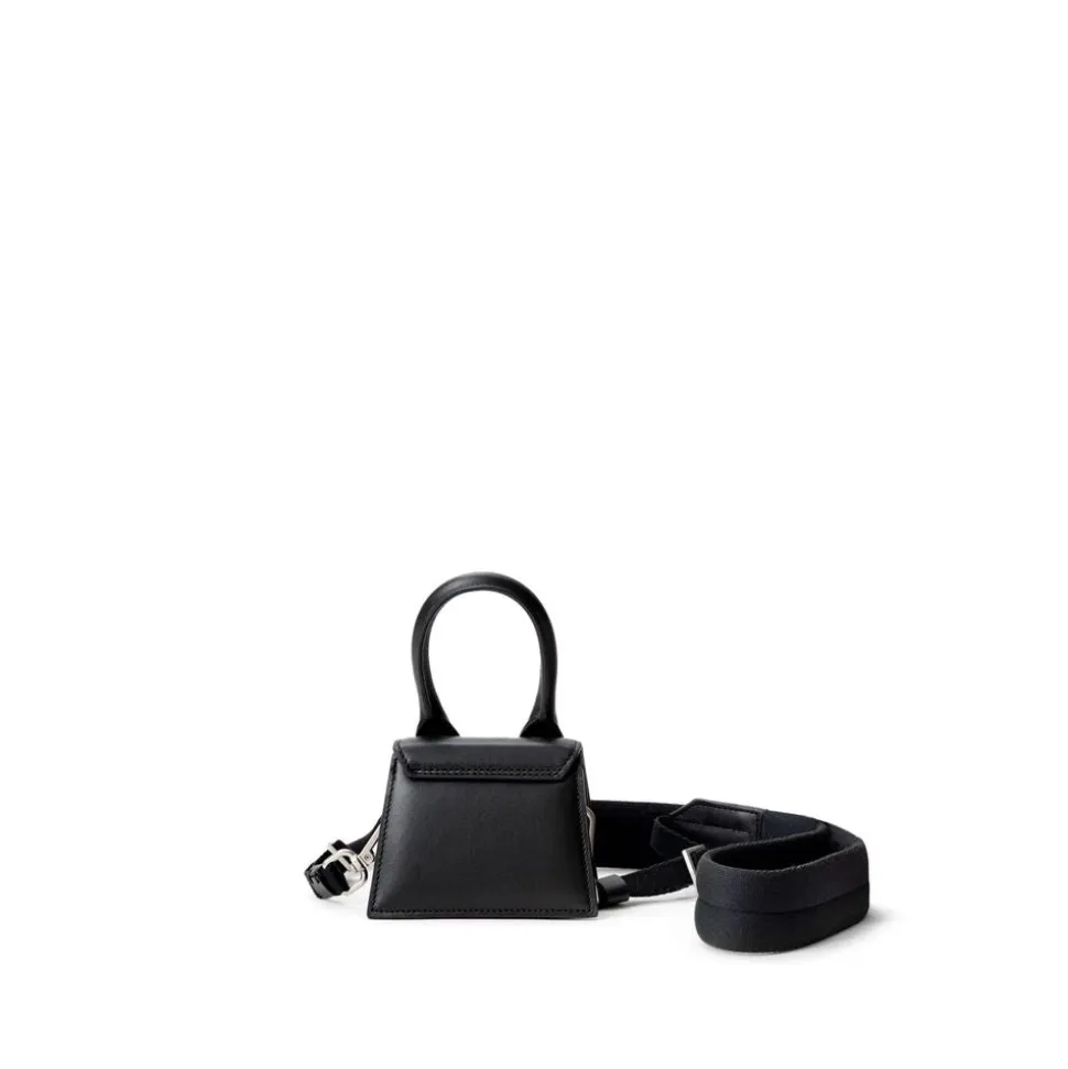 Schwarzer Leder-Sweatshirt und Mini-Tasche